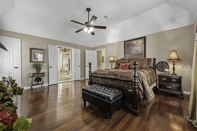 bedroom with dark wood-type flooring, ceiling fan, and ornamental molding