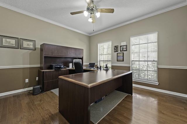 office space with ornamental molding, dark wood-type flooring, a textured ceiling, and ceiling fan