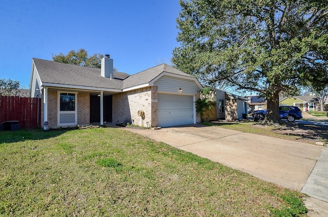 ranch-style house featuring a garage and a front lawn