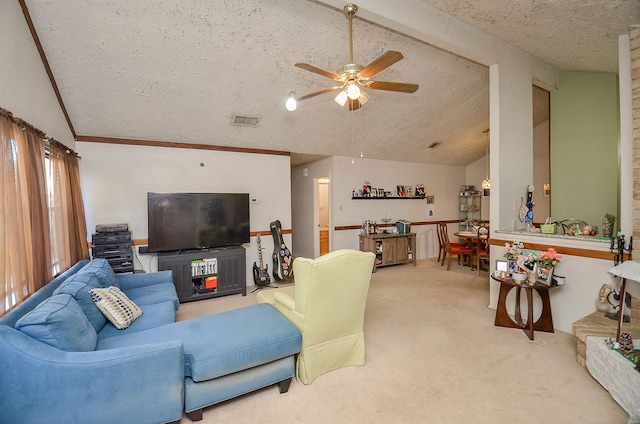 carpeted living room with ceiling fan, lofted ceiling, and a textured ceiling