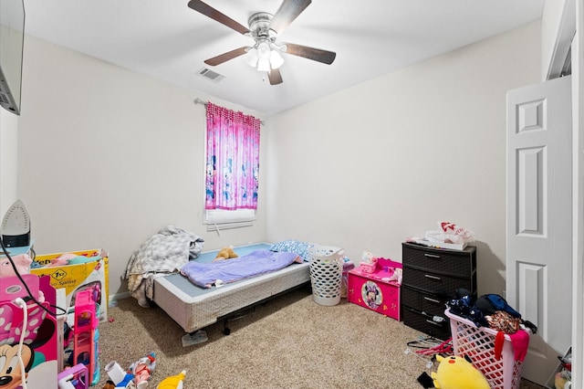 carpeted bedroom with ceiling fan