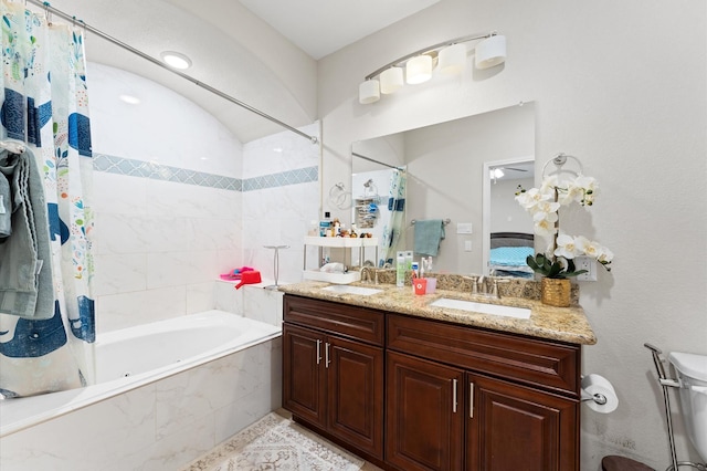 bathroom with vanity and shower / tub combo with curtain