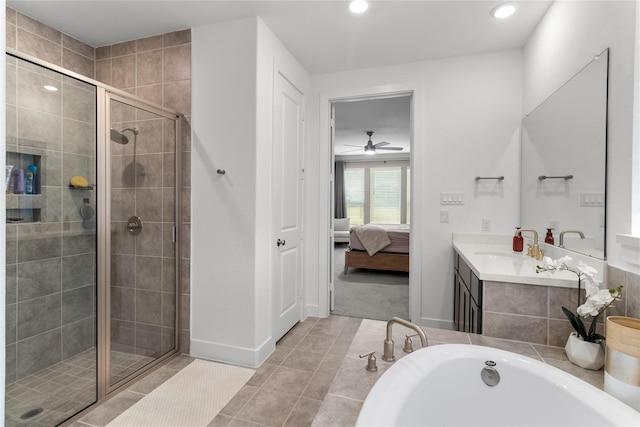 bathroom featuring a bathing tub, tile patterned floors, ensuite bathroom, vanity, and a shower stall