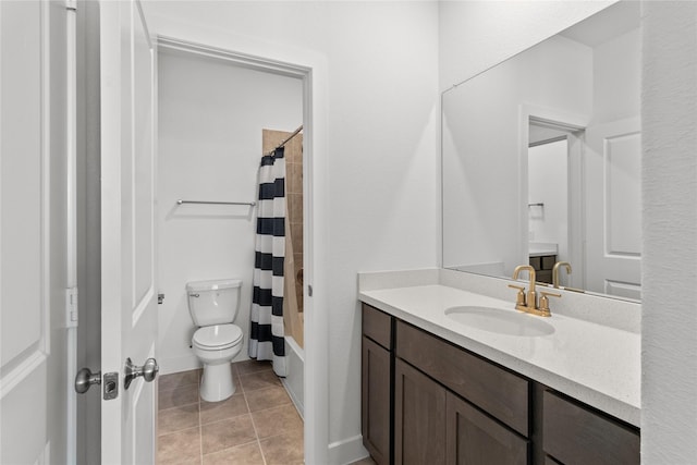 full bath with shower / tub combo, vanity, toilet, and tile patterned floors