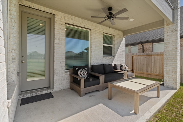 view of patio / terrace featuring ceiling fan, fence, and outdoor lounge area