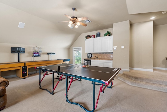 1017 Coventry Rd, Spicewood, TX 78669 - playroom featuring light carpet, vaulted ceiling, ceiling fan, wine cooler, and baseboards