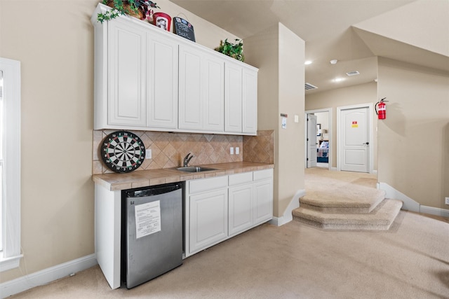 1017 Coventry Rd, Spicewood, TX 78669 - indoor wet bar with fridge, light carpet, baseboards, backsplash, and recessed lighting