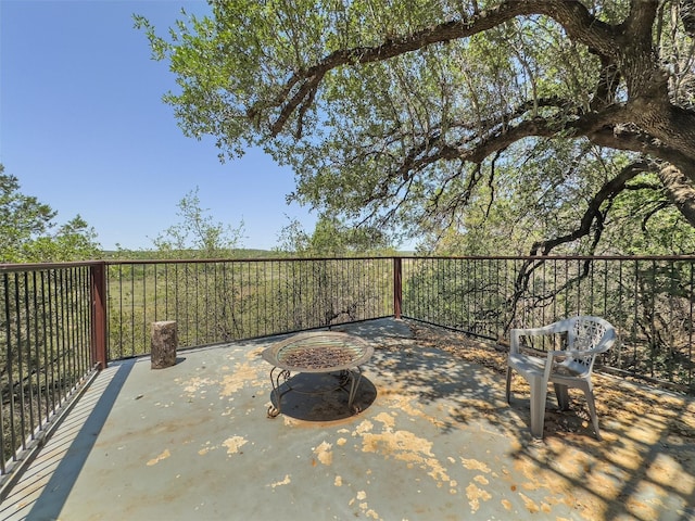 1017 Coventry Rd, Spicewood, TX 78669 - view of patio / terrace with an outdoor fire pit