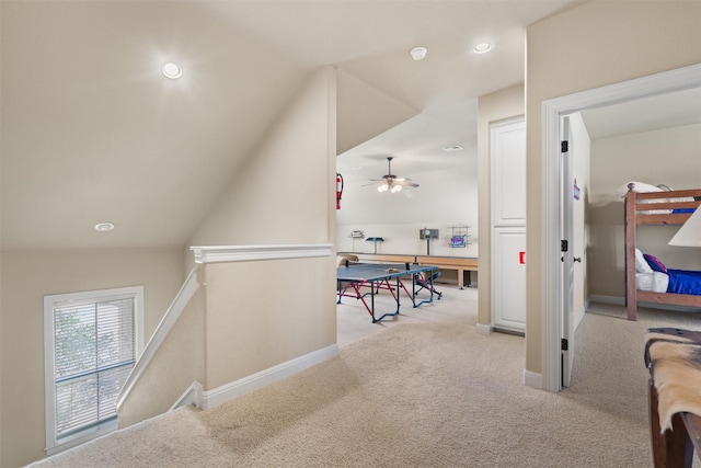1017 Coventry Rd, Spicewood, TX 78669 - hall featuring an upstairs landing, carpet, lofted ceiling, baseboards, and recessed lighting