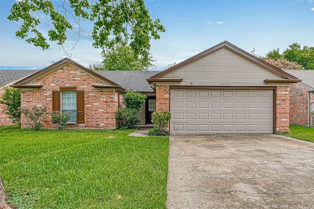 ranch-style house featuring a garage and a front lawn