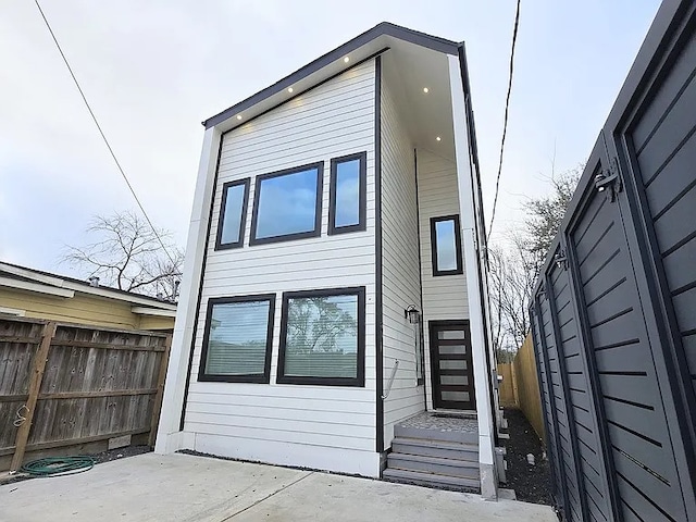 rear view of property with a patio area