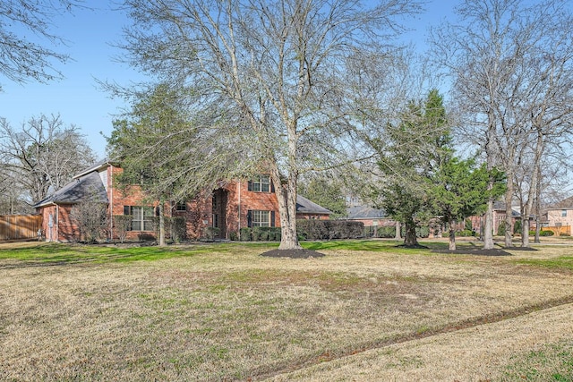 view of front of house with a front lawn