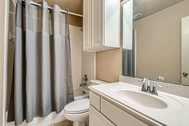 full bathroom featuring shower / bath combination with curtain, vanity, and toilet