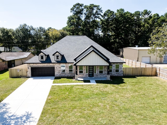 view of front facade featuring a garage and a front yard