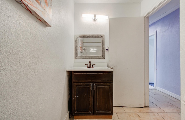 bathroom featuring vanity and tile patterned floors