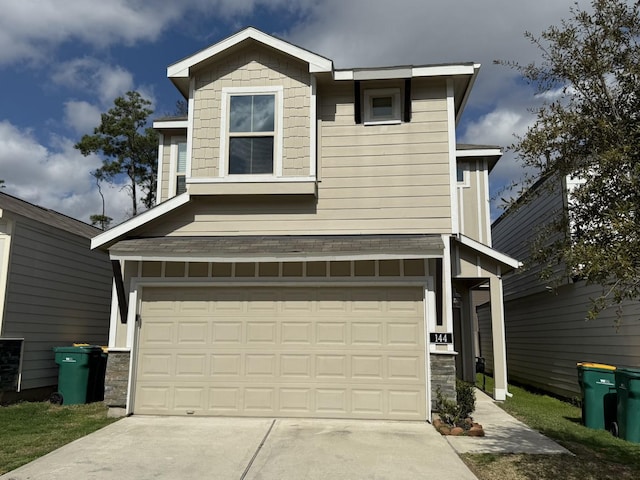 view of front of home with a garage