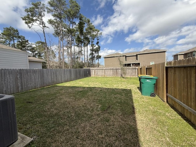 view of yard featuring central AC