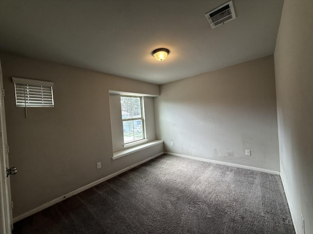 spare room with carpet flooring