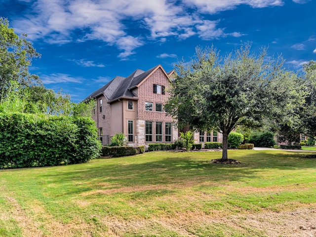 exterior space with a yard