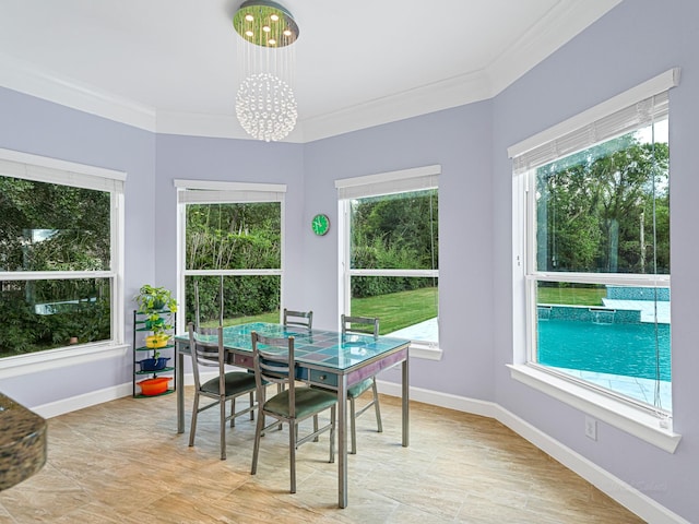 sunroom with a chandelier and a wealth of natural light