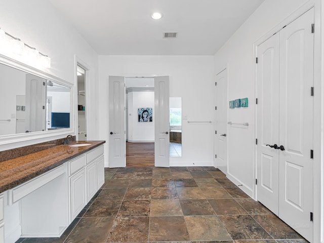 bathroom with vanity