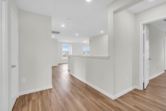 hall featuring light hardwood / wood-style flooring