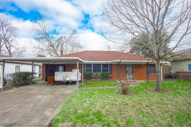 single story home with a carport and a front lawn