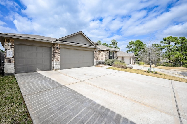 ranch-style house featuring a garage