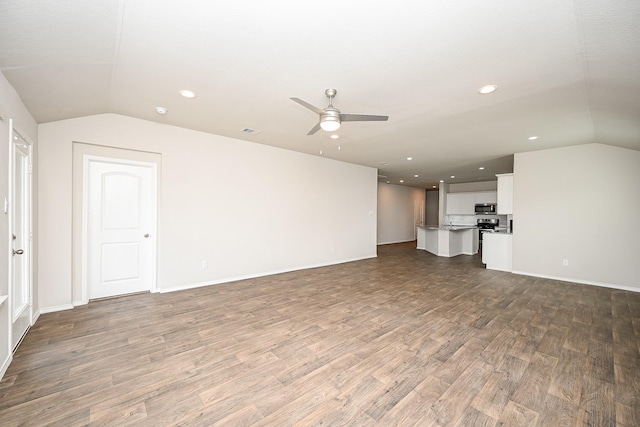 unfurnished living room featuring lofted ceiling, wood-type flooring, and ceiling fan