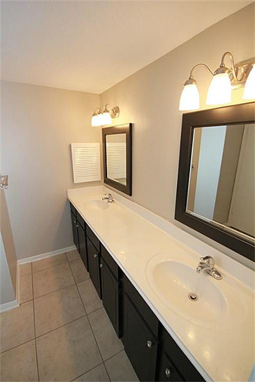 bathroom with vanity and tile patterned floors