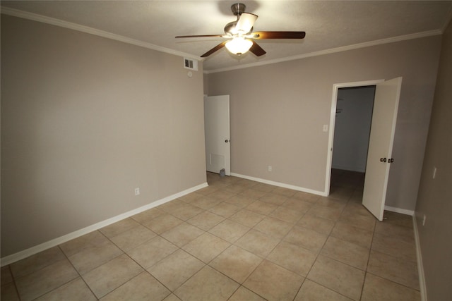 unfurnished room with crown molding, light tile patterned floors, and ceiling fan