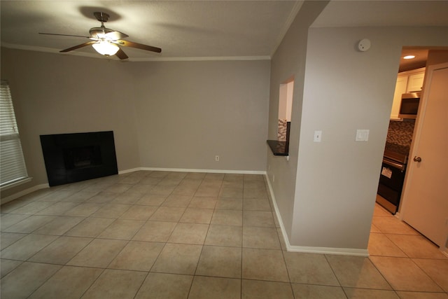 unfurnished living room featuring light tile patterned flooring, ceiling fan, and crown molding