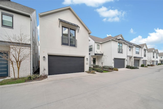 townhome / multi-family property featuring a garage