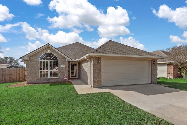 ranch-style house with a garage and a front yard