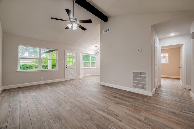 unfurnished living room featuring high vaulted ceiling, beam ceiling, ceiling fan with notable chandelier, and light hardwood / wood-style flooring