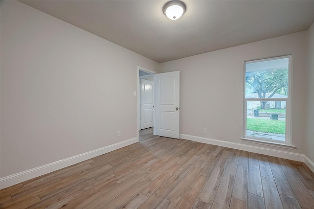 empty room featuring light hardwood / wood-style floors