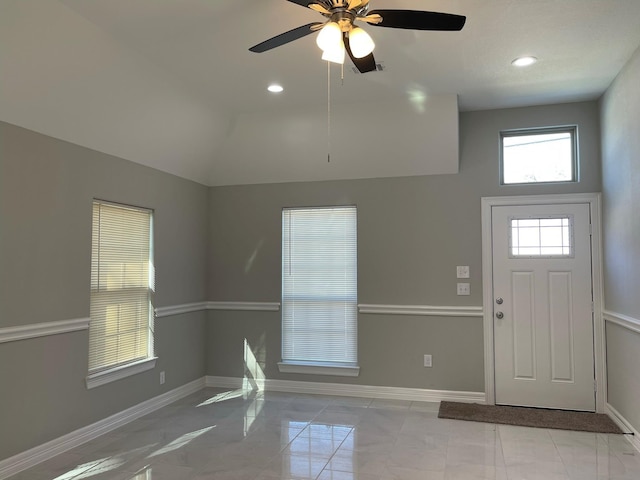 foyer with vaulted ceiling and ceiling fan