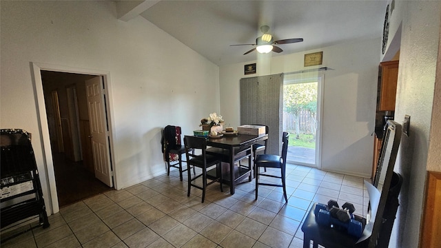 dining space featuring lofted ceiling with beams, ceiling fan, baseboards, and light tile patterned flooring