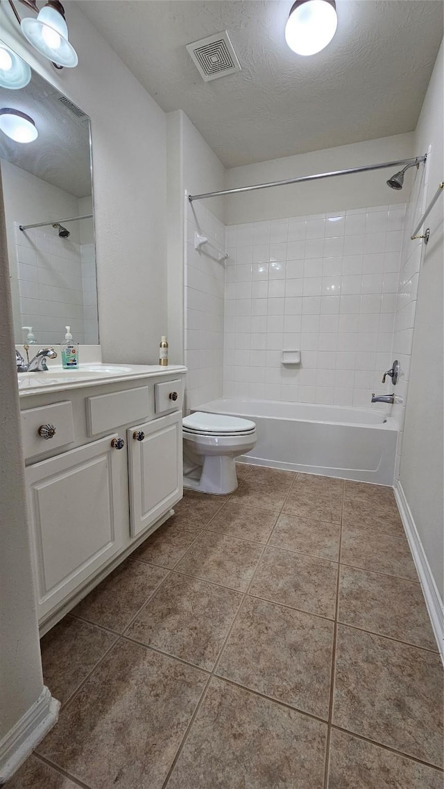 full bath featuring visible vents, toilet, tile patterned floors, a textured ceiling, and vanity