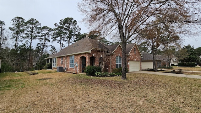 view of front facade with central AC unit, a garage, brick siding, concrete driveway, and a front lawn