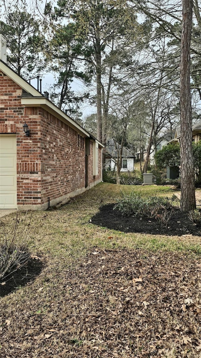 view of yard with a garage