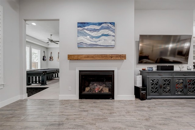 living room with ceiling fan