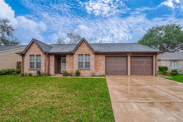 single story home with a garage and a front lawn