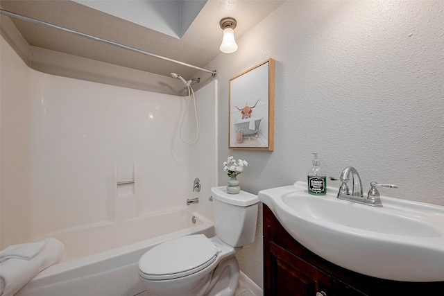 full bathroom with vanity, bathtub / shower combination, and toilet