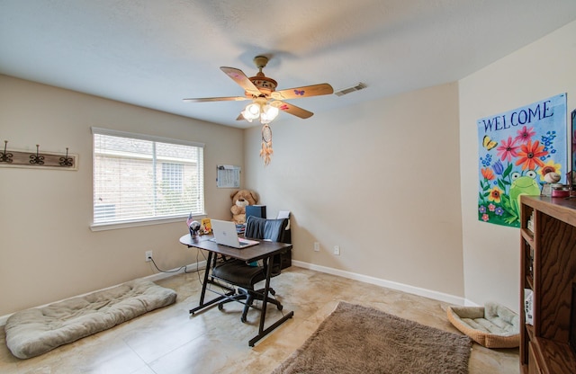 office space featuring ceiling fan