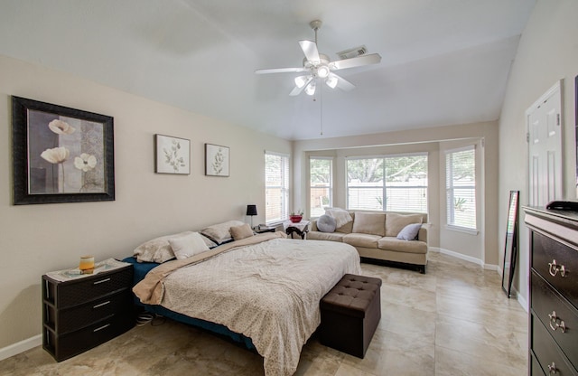 bedroom with ceiling fan and vaulted ceiling