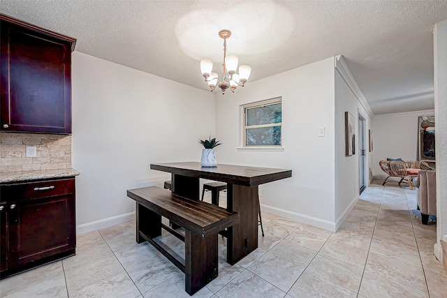 tiled dining room with crown molding, a textured ceiling, and a chandelier