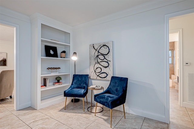 sitting room featuring light tile patterned flooring, ornamental molding, and built in features