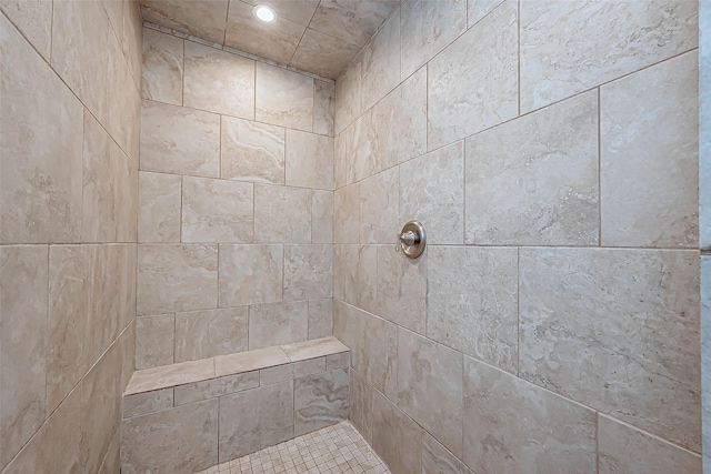 details featuring a tile shower