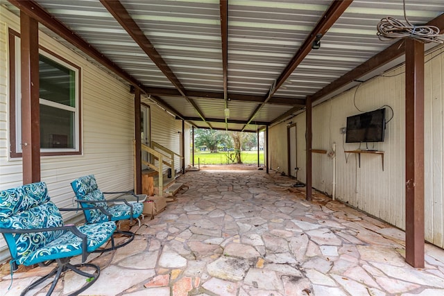 view of patio featuring an attached carport